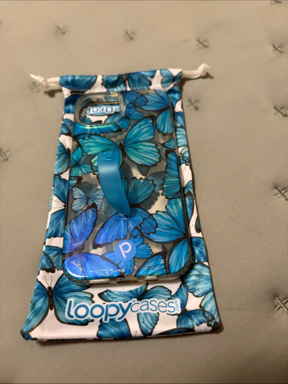 Loopy Case Blue Butterfly Phone Case with Integrated Grip Strap